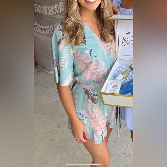 Boutique romper. Size small. Sky blue with mauve and brown accents. - Picture 1 of 2